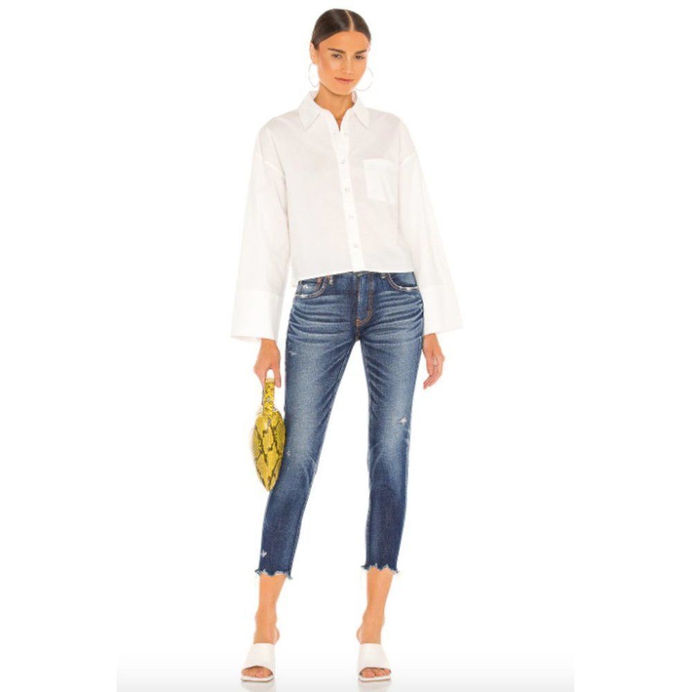 Moussy Vintage dark wash cotton denim distressed tapered cropped raw cut jeans